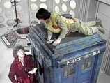 The Doctor and Adric with the Police Box